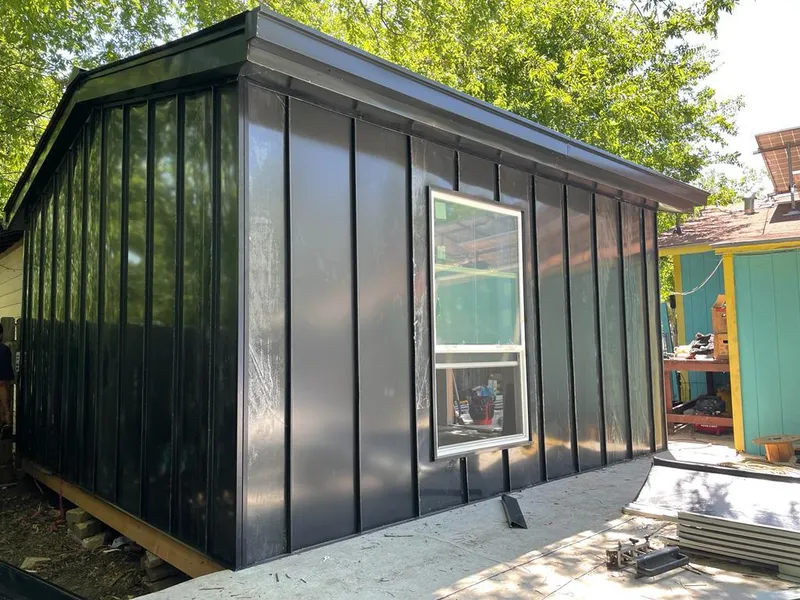 Black standing seam metal wall panels for Metal Roof Installation in Old Westbury