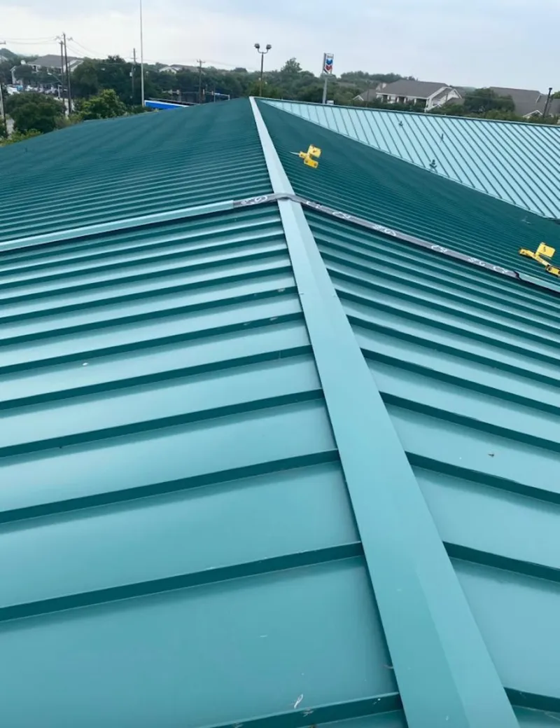 Green commercial metal roof ridge and valley for Metal Roof Repair in Old Westbury